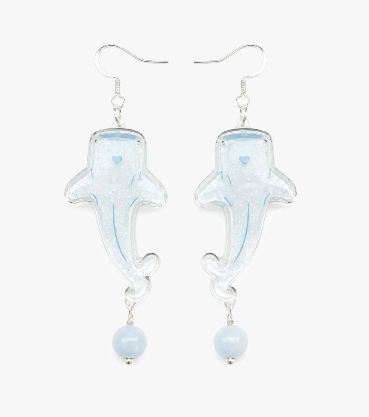 translucent whale shark drop earrings with pearly texture, soft blue details, and pale blue bead drops.