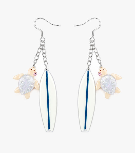 Turtle and surfboard drop earrings in pale blue, white, and silver