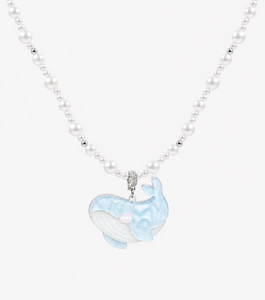 Pale blue and white whale-tail pendant necklace with white bead accents.
