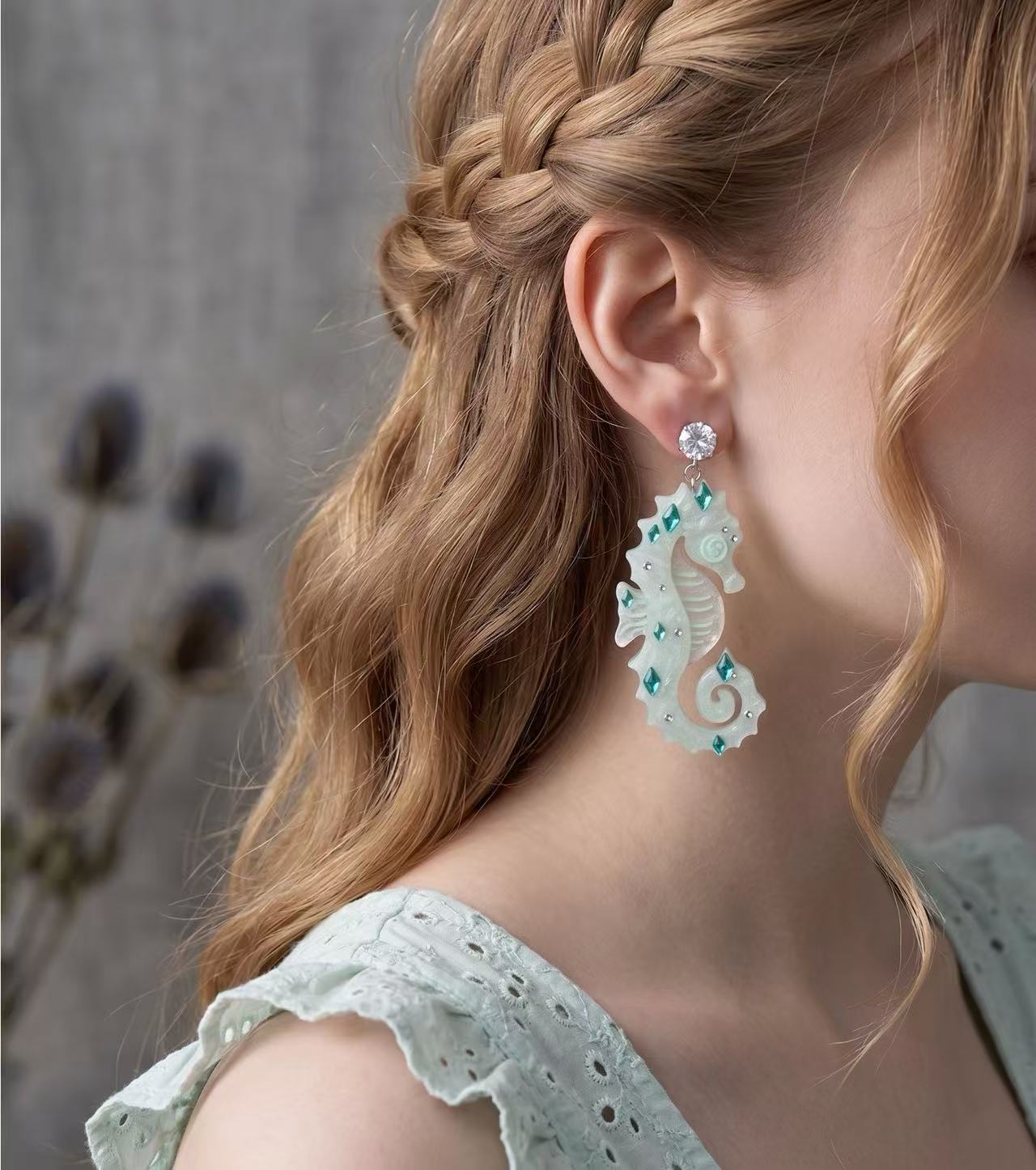 icy blue glitter seahorse earrings